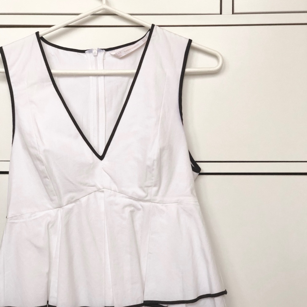 White peplum top